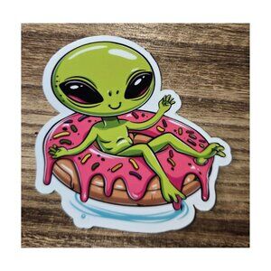 Alien in a donut float sticker